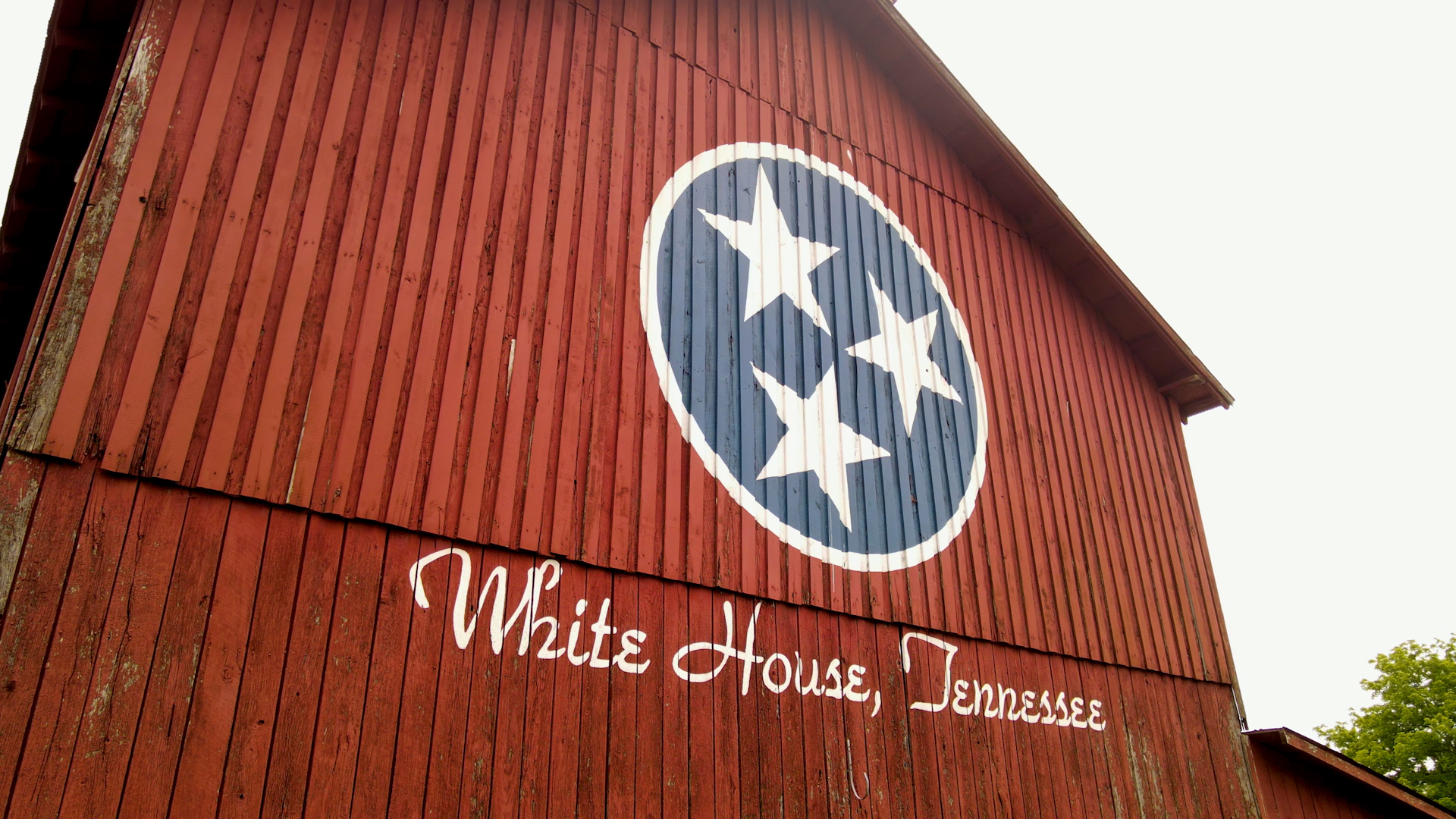 Red Barn with Tennessee Ti-Star Logo and inscription of White House, Tennessee