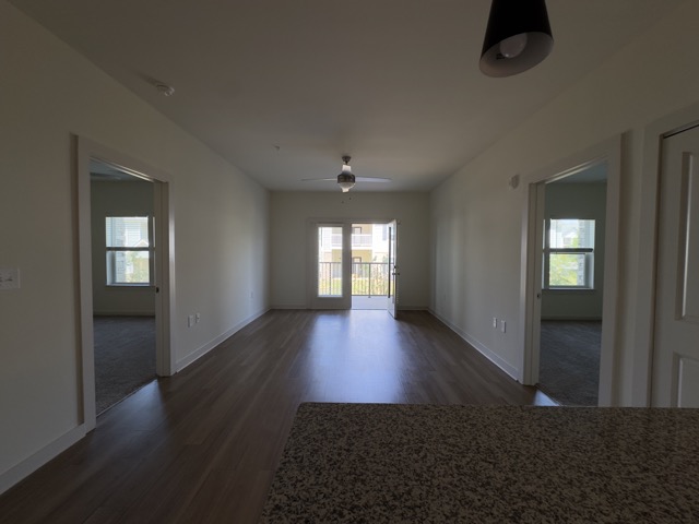 Wide view of Channel Floor Plan Living Area and doors to both bedrooms Wide view of Channel Floor Plan Living Area and doors to both bedrooms