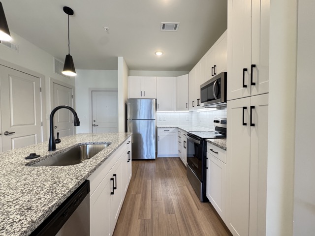 Kitchen of 1b/1b Alley Floor Plan Apartment at Sage North in White House, Tennessee