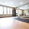 Yoga studio with mirror wall and bright windows at Sage North apartments in White House, TN.