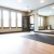 yoga studio with mirror wall and bright windows